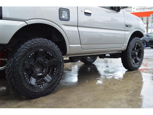 ジムニー 　リフトアップ　ＲＰＧショック　Ｂｒａｔ１６インチアルミ＆ジーランダーＭ／Ｔ　前後ショートバンパー　Ｌｉｎｋｓマフラー　Ｂｒａｔリアスポイラー　社外リアテール　クオーレモジュレシート　ＳＤナビＴＶ（12枚目）