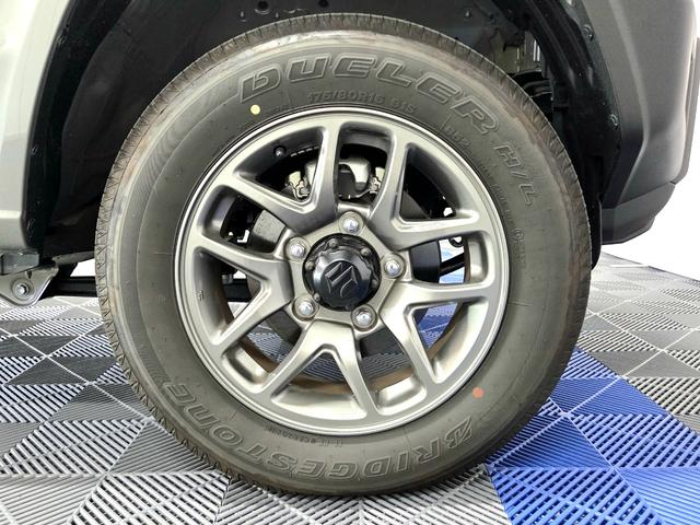 ジムニー 　セーフティサポート／４ＷＤ／カロッツェリアナビ／地デジ／バックカメラ／黒革調シートカバー／ＥＴＣ／クルーズコントロール／シートヒーター／純正１６インチアルミ／社外フロントグリル／純正フロントグリル有（46枚目）
