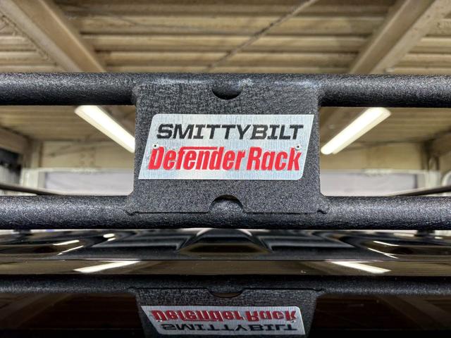 ジープ・ラングラーアンリミテッド サハラ レザーパッケージ/アダプティブクルーズコントロール/純正ナビ/自社買取車/BESTOPサンライダー/スミッティビルトルーフラック/背面ハードタイヤカバー/黒革シート/バックカメラ/ブルートゥース接続(18枚目)