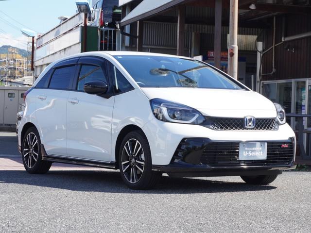 フィット ｅ：ＨＥＶＲＳ　９インチプレミアムインターナビ／ドラレコ／ＥＴＣ／バックカメラ／アダプティブクルーズコントロール／Ｂｌｕｅｔｏｏｔｈ／パドルシフト／電子制御パーキングブレーキ／ドアバイザー／ＬＥＤヘッドライト／ＴＶ（11枚目）