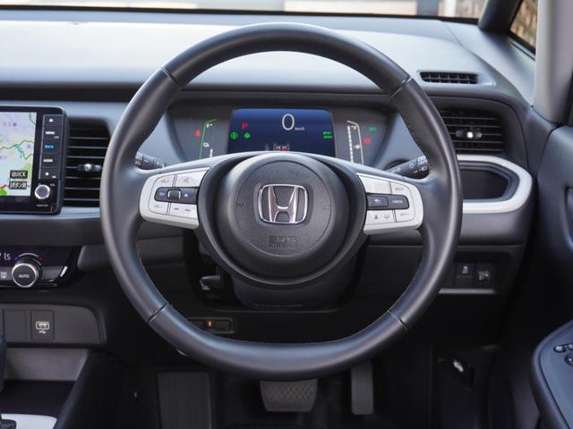 フィット e:HEVホーム 9インチプレミアムインターナビ/前後ドラレコ/ETC/バックカメラ/アダプティブクルーズコントロール/Bluetooth/KLEDヘッドライト/電子制御パーキングブレーキ/安全運転支援/TV/DVD(29枚目)