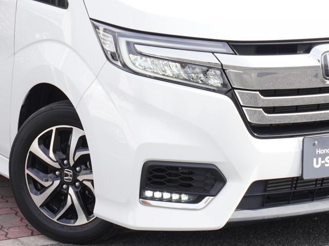 ステップワゴンスパーダ スパーダホンダセンシング　９インチプレミアムインターナビ／前後ドラレコ／ＥＴＣ／バックカメラ／両側電動スライドドア／アダプティブクルーズコントロール／Ｂｌｕｅｔｏｏｔｈ／パドルシフト／ロールサンシェード／後席用テーブル／ＴＶ（12枚目）