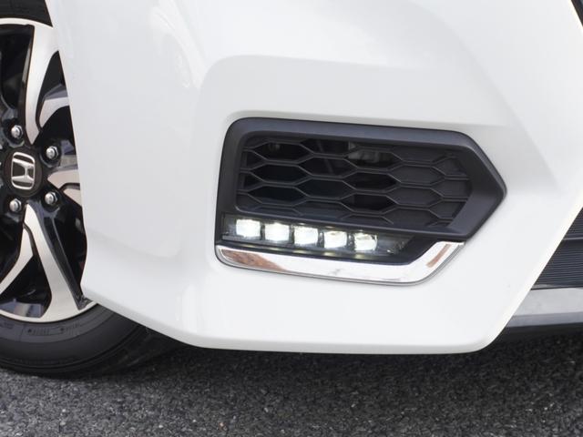 ステップワゴンスパーダ スパーダホンダセンシング　９インチプレミアムインターナビ／前後ドラレコ／ＥＴＣ／バックカメラ／両側電動スライドドア／アダプティブクルーズコントロール／Ｂｌｕｅｔｏｏｔｈ／パドルシフト／ロールサンシェード／後席用テーブル／ＴＶ（14枚目）