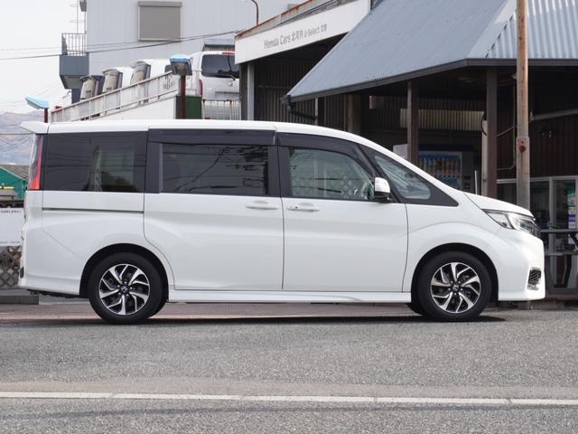 ステップワゴンスパーダ スパーダホンダセンシング　９インチプレミアムインターナビ／前後ドラレコ／ＥＴＣ／バックカメラ／両側電動スライドドア／アダプティブクルーズコントロール／Ｂｌｕｅｔｏｏｔｈ／パドルシフト／ロールサンシェード／後席用テーブル／ＴＶ（18枚目）