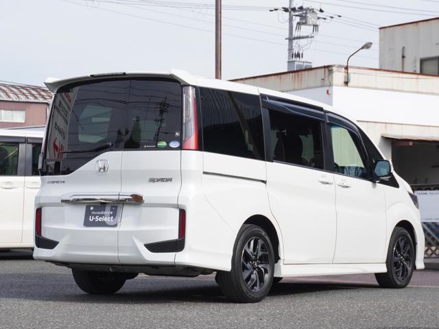 ステップワゴンスパーダ スパーダホンダセンシング　９インチプレミアムインターナビ／前後ドラレコ／ＥＴＣ／バックカメラ／両側電動スライドドア／アダプティブクルーズコントロール／Ｂｌｕｅｔｏｏｔｈ／パドルシフト／ロールサンシェード／後席用テーブル／ＴＶ（20枚目）