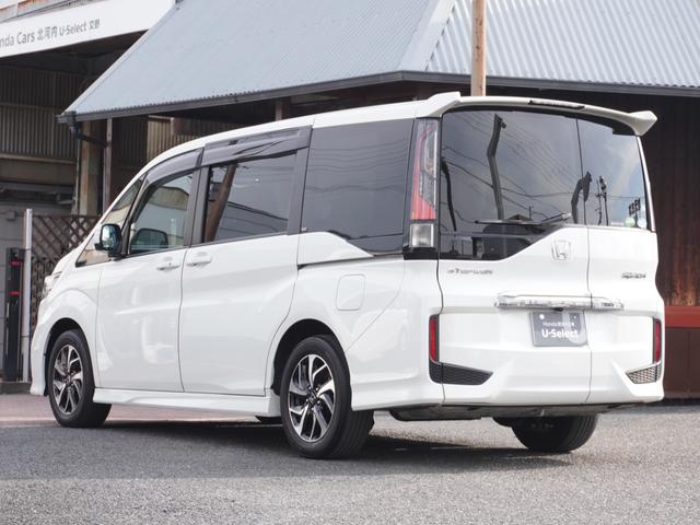 ステップワゴンスパーダ スパーダホンダセンシング　９インチプレミアムインターナビ／前後ドラレコ／ＥＴＣ／バックカメラ／両側電動スライドドア／アダプティブクルーズコントロール／Ｂｌｕｅｔｏｏｔｈ／パドルシフト／ロールサンシェード／後席用テーブル／ＴＶ（22枚目）