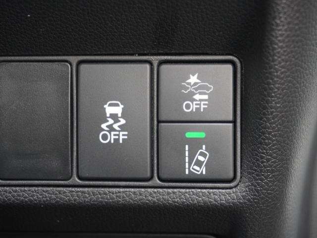 ステップワゴンスパーダ スパーダホンダセンシング　９インチプレミアムインターナビ／前後ドラレコ／ＥＴＣ／バックカメラ／両側電動スライドドア／アダプティブクルーズコントロール／Ｂｌｕｅｔｏｏｔｈ／パドルシフト／ロールサンシェード／後席用テーブル／ＴＶ（39枚目）