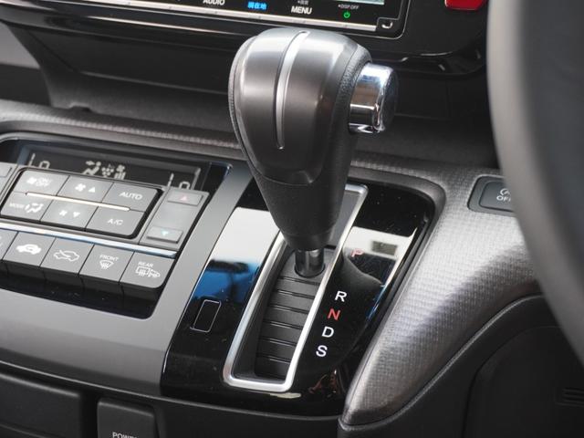 ステップワゴンスパーダ スパーダホンダセンシング　９インチプレミアムインターナビ／前後ドラレコ／ＥＴＣ／バックカメラ／両側電動スライドドア／アダプティブクルーズコントロール／Ｂｌｕｅｔｏｏｔｈ／パドルシフト／ロールサンシェード／後席用テーブル／ＴＶ（54枚目）
