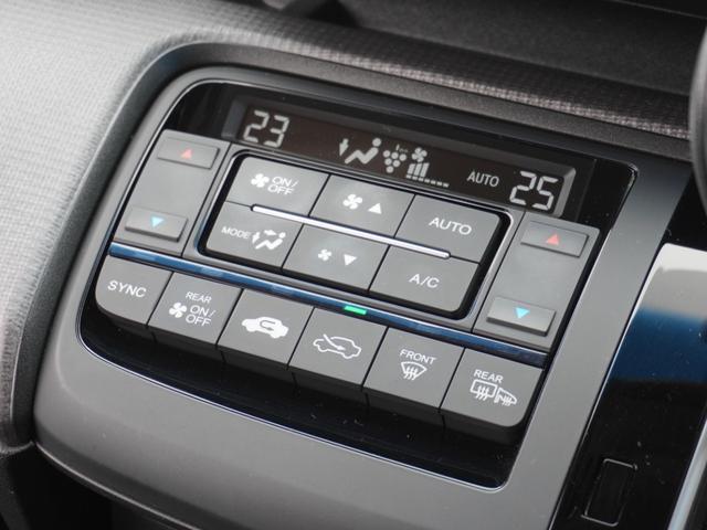 ステップワゴンスパーダ スパーダホンダセンシング　９インチプレミアムインターナビ／前後ドラレコ／ＥＴＣ／バックカメラ／両側電動スライドドア／アダプティブクルーズコントロール／Ｂｌｕｅｔｏｏｔｈ／パドルシフト／ロールサンシェード／後席用テーブル／ＴＶ（56枚目）