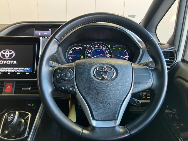 ヴォクシー ハイブリッドＺＳ　煌ＩＩＩ　９インチＳＤナビ・Ｂｌｕｅｔｏｏｔｈオーディオ・フルセグ・Ｂカメラ・フリップダウンモニター・両側パワースライド・クルーズコントロール・２．０ＥＴＣ・プリクラッシュセーフティー・レーンキープ・純正ＡＷ（64枚目）