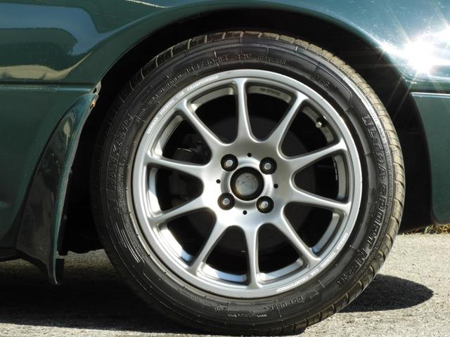 ユーノスロードスター スペシャルパッケージ 5速マニュアル ガラススクリーンソフトトップ 社外15インチAW テイン車高調サス(46枚目)