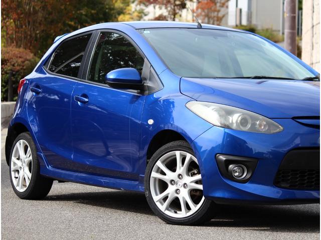 デミオ スポルト　５速マニュアル　禁煙車　オートエグゼマフラー　オートエグゼＤ型革巻ステアリング　マツダディーラー点検　バッテリー新品　ケンウッドドラレコ　ナビ　フルセグテレビ　ＥＴＣ　オートエアコン　キーレス（21枚目）