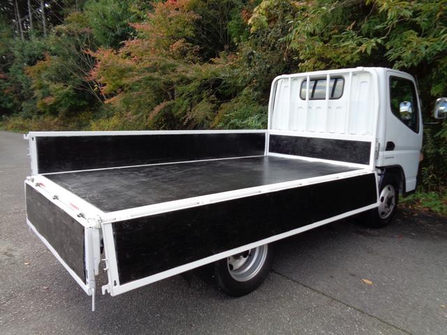 ＮＴ４５０アトラス フルスーパーローＤＸ　２トン積み４ナンバー　リアＷタイヤ　ナビＴＶ　ＥＴＣ　キーレス　左電格ミラー　フォグランプ　坂道発進補助装置　ＥＣＯモードスイッチ　アイドリングストップ　ヘッドライトレベライザー　ＩＣターボ　６速ＡＴ（9枚目）