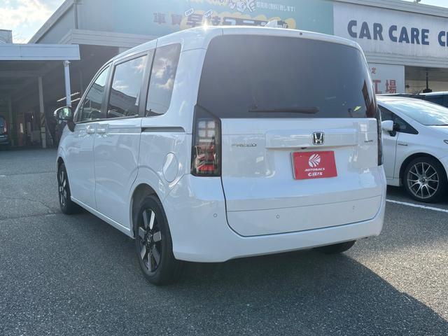 フリード ｅ：ＨＥＶエアー　ＥＸ　登録済未使用車　ホンダセンシング　ＬＥＤヘッドライト　両側パワースライドドア　シートヒーター　リアクーラー　バックカメラ　アクティブクルーズコントロール　スマートキー　１５インチアルミホイル（12枚目）