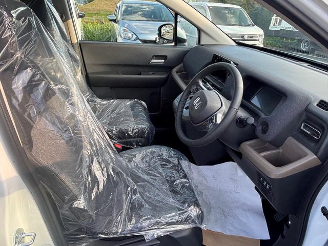 フリード ｅ：ＨＥＶエアー　ＥＸ　登録済未使用車　ホンダセンシング　ＬＥＤヘッドライト　両側パワースライドドア　シートヒーター　リアクーラー　バックカメラ　アクティブクルーズコントロール　スマートキー　１５インチアルミホイル（22枚目）