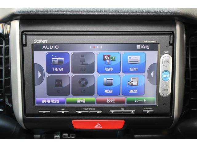 N-BOXカスタム G ターボSSパッケージ 純正ナビ Bカメラ 両側電動ドア HID ETC クルコン 盗難防止 スマートキー オートエアコン オートライト ESC ABS 純正AW 電格ミラー パワーウィンドウ 平成25年式(4枚目)