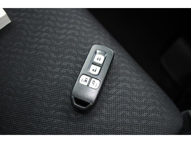 N-BOXカスタム G ターボSSパッケージ 純正ナビ Bカメラ 両側電動ドア HID ETC クルコン 盗難防止 スマートキー オートエアコン オートライト ESC ABS 純正AW 電格ミラー パワーウィンドウ 平成25年式(18枚目)