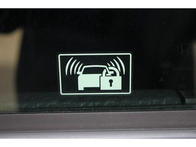 N-BOXカスタム G ターボSSパッケージ 純正ナビ Bカメラ 両側電動ドア HID ETC クルコン 盗難防止 スマートキー オートエアコン オートライト ESC ABS 純正AW 電格ミラー パワーウィンドウ 平成25年式(54枚目)