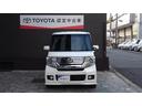 N-BOXカスタム G・Lパッケージ アイドリングストップ車 ナビ・TV フルフラットシート スマキ- フロントベンチシート 地デジTV パワーウィンドウ 盗難防止システム オートエアコン パワステ DVD再生可 キーレスエントリー 中古車画像_3