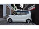 N-BOXカスタム G・Lパッケージ アイドリングストップ車 ナビ・TV フルフラットシート スマキ- フロントベンチシート 地デジTV パワーウィンドウ 盗難防止システム オートエアコン パワステ DVD再生可 キーレスエントリー 中古車画像_4