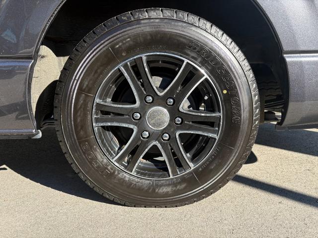 レジアスエースバン スーパーGL ダークプライム ワンオーナー ディーゼル ETC フルセグ Bluetooth バックカメラ ベッドキット レーンキープアシスト 衝突被害軽減システム オートライト スマートキー 電動格納ミラー ハーフレザーシート(14枚目)