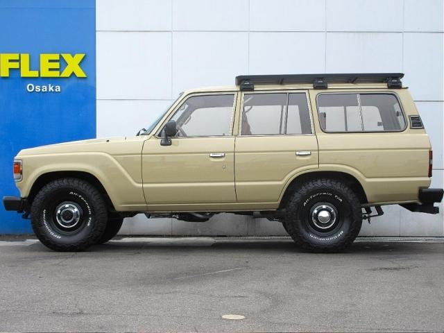 ランドクルーザー６０ ＶＸ　６２Ｇ／ＮＯＸ－ＰＭ適合／全国登録可能　ベージュ全塗装　ロールーフ換装／丸目換装／ナロー換装　買取直販車　ランクル６０ガソリンオートマ　輸出用スチールホイールＢＦグッドリッチＫＯ２ブラウンシートカバー（7枚目）