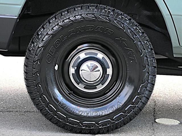 ランドクルーザープラド SXワイド アーバンカーキ全塗装 ナロー換装 パイオニア製ディスプレイオーディオ ヨコハマジオランダーX-ATタイヤ 輸出用鉄チンホイール ウッドコンビステアリング 3列目有 ノーマル車高 新品サイドエンブレム(3枚目)