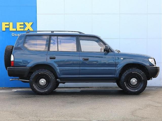 ランドクルーザープラド ＴＸ　前期型　アルルブルー全塗装済　丸目・ナロー換装　ＴＯＹＯＴＡグリル　ＢＦグッドリッチＡＴタイヤ　ＤＥＡＮクロスカントリー　パイオニア製フルセグナビ　バックカメラ　サンルーフ　ウッドコンビステアリング（5枚目）