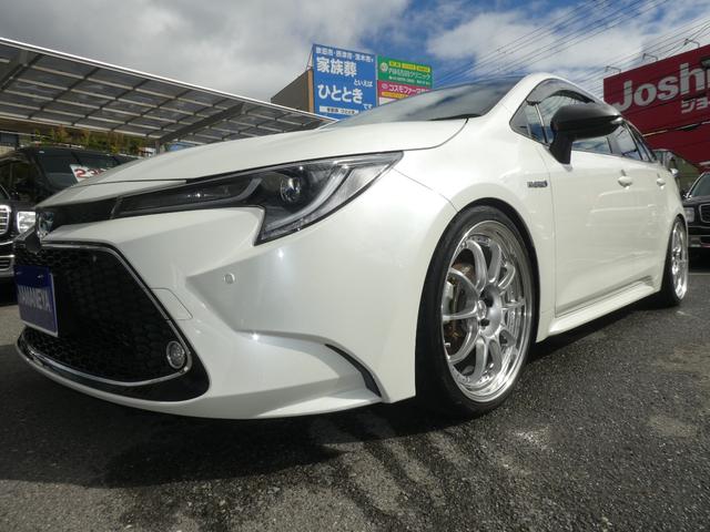 カローラツーリング ハイブリッド　ダブルバイビー　全国一年保証付／ＲＳＲ車高調／ＳＳＲ１９インチアルミ／９インチディスプレイオーディオ／ＴＶ／ナビ／シートヒーター／（16枚目）