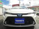 カローラツーリング ハイブリッド　ダブルバイビー　全国一年保証付／ＲＳＲ車高調／ＳＳＲ１９インチアルミ／９インチディスプレイオーディオ／ＴＶ／ナビ／シートヒーター／（7枚目）