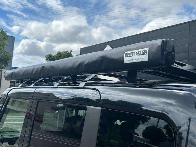 スペーシアカスタム ハイブリッドＸＳ　全方位カメラ付き９インチメモリーナビ車　ＢＫスタイルコンプリートカー　メッキ部一式ラプター塗装　ＴＯＹＯタイヤ　ＭＫ５６ブラック　１５インチホイール　ルーフラック　ＩＰＦワークランプ　サイドオーニング（24枚目）