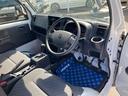 スーパーキャリイ　Ｘ　３型　　４ＷＤ　５ＡＧＳ　ＯＫ保証付き　デュアルカメラブレーキサポート（衝突被害軽減ブレーキ）　パートタイム４ＷＤ　５ＡＧＳ　キーレスエントリー　パワーウィンドウ　荷台マット　荷台作業灯　ドアバイザー　フォグランプ　オートライト（31枚目）