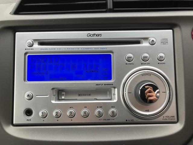 フィット G ワンオーナー/ドアミラーウインカー/UVカット機能付きプライバシーガラス/運転席ハイトアジャスター/CDデッキ/キーレスエントリー/ドライブレコーダー/社外アルミホイール(13枚目)