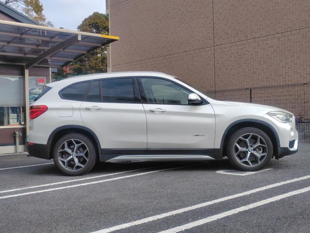Ｘ１ ｘＤｒｉｖｅ　２０ｉ　ｘライン　純正ナビ　バックカメラ　ミラー一体型ＥＴＣ　Ｂｌｕｅｔｏｏｔｈ　インテリジェントセーフティ　パーキングサポート　電動リヤゲート　スマートキー　ＬＥＤヘッドライト　純正１８インチアルミホイール（13枚目）