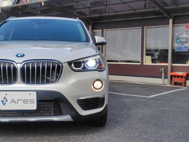 Ｘ１ ｘＤｒｉｖｅ　２０ｉ　ｘライン　純正ナビ　バックカメラ　ミラー一体型ＥＴＣ　Ｂｌｕｅｔｏｏｔｈ　インテリジェントセーフティ　パーキングサポート　電動リヤゲート　スマートキー　ＬＥＤヘッドライト　純正１８インチアルミホイール（18枚目）