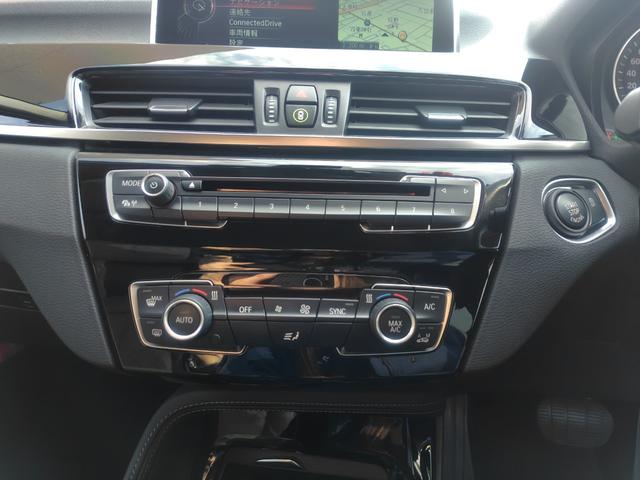 Ｘ１ ｘＤｒｉｖｅ　２０ｉ　ｘライン　純正ナビ　バックカメラ　ミラー一体型ＥＴＣ　Ｂｌｕｅｔｏｏｔｈ　インテリジェントセーフティ　パーキングサポート　電動リヤゲート　スマートキー　ＬＥＤヘッドライト　純正１８インチアルミホイール（35枚目）