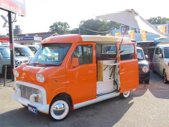 NV100クリッパーバン DX 期間限定販売 移動販売車 キッチンカー ケータリング 3槽シンク 販売窓口2箇所 パラソル 全塗装済み カスタムカー 電源コンセント ユーザー買取車 純正オーディオ(11枚目)