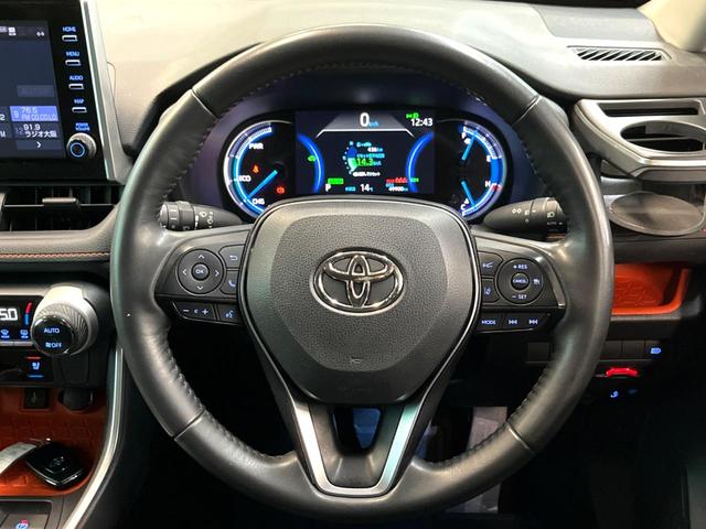 ＲＡＶ４ ハイブリッドアドベンチャー　純正９型ディスプレイオーディオ　レーダークルーズコントロール　ブラインドスポットモニター　黒革調シート　シートベンチレーション　メモリーシート　ステアリングヒーター　禁煙車　Ｂｌｕｅｔｏｏｔｈ（11枚目）
