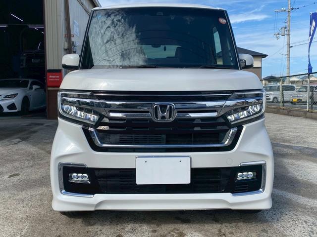N-BOXカスタム Lターボ ユーザー買取車 ワンオーナー ギャザーズナビ Bカメラ ETC 前後ドラレコ 両側パワスラ ホンダセンシング USBポート スマートキー2個 ハーフレザーシート サイドバイザー マット 取説&保証書(2枚目)