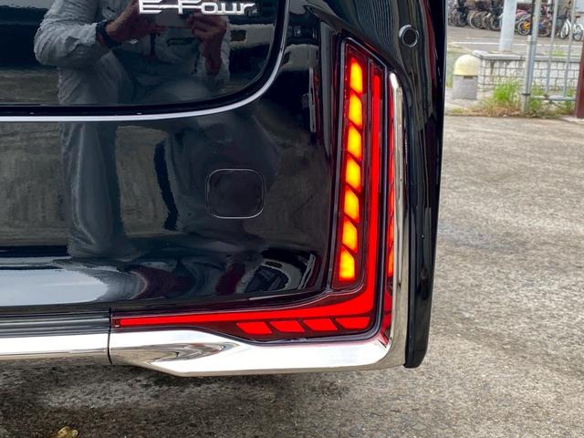 ヴェルファイアハイブリッド Z プレミア ワンオーナー 禁煙車 4WD サンセットブラウン内装 純正14型ナビ デジタルインナーミラー 左右独立ムーンルーフ パノラミックビューカメラ HUD パワーバックドア 両側電動スライド ETC2.0(13枚目)
