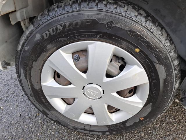 ムーヴコンテ Ｘ　運転席メモリーパワーシート　スマートキー　社外品ナビ　テレビ　オートエアコン　禁煙車　ウインカー付きドアミラー（8枚目）