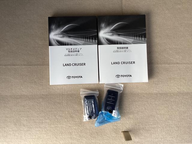 ランドクルーザー ZX 登録済未使用車 改良後モデル モデリスタエアロ 12.3型ナビ JBLサウンド リヤエンターテイメント ブラックルーフレール クールボックス 内装ベージュ ムーンルーフ 空気圧警報システム(80枚目)