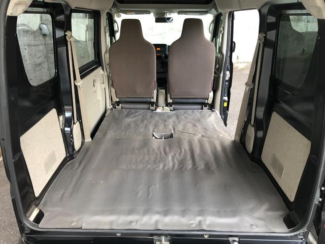 ＮＶ１００クリッパーバン ＤＸ　ＧＬエマージェンシーブレーキパッケージ　ハイルーフ　５ＡＧＳ車　前方踏み間違い防止　市販アルミホイール　ＧＬパッケージで前席パワーウインドウ、電動ドアミラーも装備。リヤはベンチシートで荷物もたっぷり。緊急ブレーキ・踏み間違い防止で安全面も◎（36枚目）