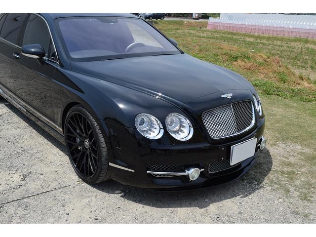 フライングスパー MANSORY FS63 630馬力 MANSORYフルエアロ 22インチアルミホイール ツインターボエンジン630馬力 HDD ETC 黒革シート MANSORYチューニング車両 コーナーセンサー(50枚目)