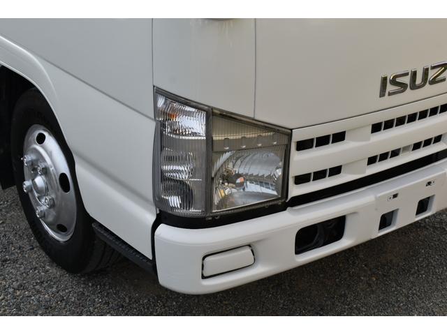 エルフトラック 　３トン深ダンプ　観音開きドア　パワステアリング　パワーウィンドウ　ＡＢＳ　ＥＴＣ　シート運転席張替え済み　白色再塗装済み　土砂禁車両　乗車定員３人　型式ＢＤＧ－ＮＫＲ８５ＡＮ　積載量３０００キロ　６速（59枚目）