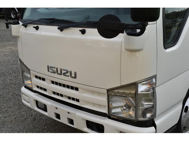 エルフトラック 　３トン深ダンプ　観音開きドア　パワステアリング　パワーウィンドウ　ＡＢＳ　ＥＴＣ　シート運転席張替え済み　白色再塗装済み　土砂禁車両　乗車定員３人　型式ＢＤＧ－ＮＫＲ８５ＡＮ　積載量３０００キロ　６速（68枚目）