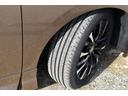 スペーシャスラウンジ　ＨＥＶスペーシャスラウンジ　ユニバーサルステップ　寒冷地仕様　４ＷＤ　後席モニター　モデリスタエアロ　冷蔵庫　　ヘッドレストスピーカー　カーテン　ＪＢＬ　改良後車両　　置くだけ充電　純正フロアーマット（53枚目）