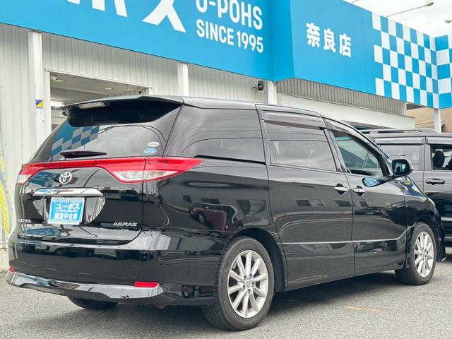 エスティマ ２．４アエラス　Ｇエディション　禁煙車・アルパインフリップダウンモニター・ナビ・Ｂｌｕｅｔｏｏｔｈ対応・ＤＶＤ再生・ＴＶ・Ｂカメラ・ＨＩＤ・ビルトインＥＴＣ・ウッドコンビハンドル・両側電動スライドドア・スペアキー有（10枚目）