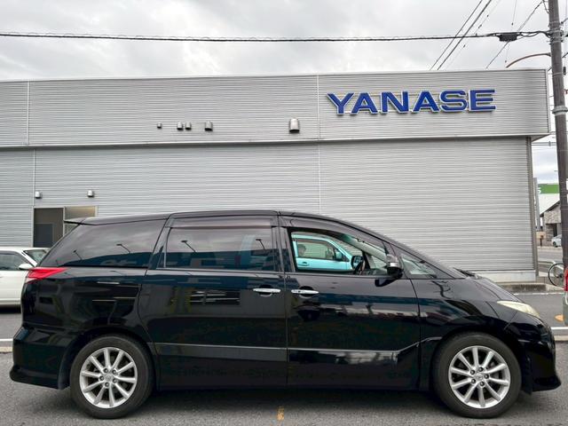 エスティマ ２．４アエラス　Ｇエディション　禁煙車・アルパインフリップダウンモニター・ナビ・Ｂｌｕｅｔｏｏｔｈ対応・ＤＶＤ再生・ＴＶ・Ｂカメラ・ＨＩＤ・ビルトインＥＴＣ・ウッドコンビハンドル・両側電動スライドドア・スペアキー有（12枚目）