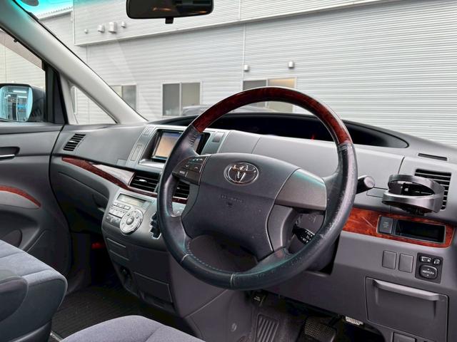 エスティマ ２．４アエラス　Ｇエディション　禁煙車・アルパインフリップダウンモニター・ナビ・Ｂｌｕｅｔｏｏｔｈ対応・ＤＶＤ再生・ＴＶ・Ｂカメラ・ＨＩＤ・ビルトインＥＴＣ・ウッドコンビハンドル・両側電動スライドドア・スペアキー有（19枚目）